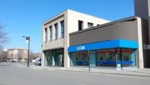 a building with a blue sign on the front